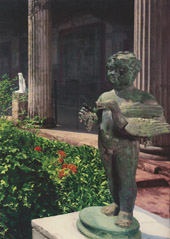 A small bronze statue in a Roman  home in Pompeii