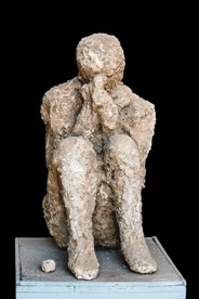 The last moments of an ill-fated Pompeiian, frozen forever in plaster
