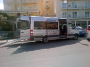 Minivan with ramp for wheelchair confined visitors