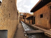 A view of a road with buildings in Herculaneum ruins