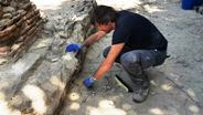 Archaeologist at work in an excavation area near Pompeii