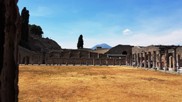 Pompeii ruins and, in the background, the Vesuvius